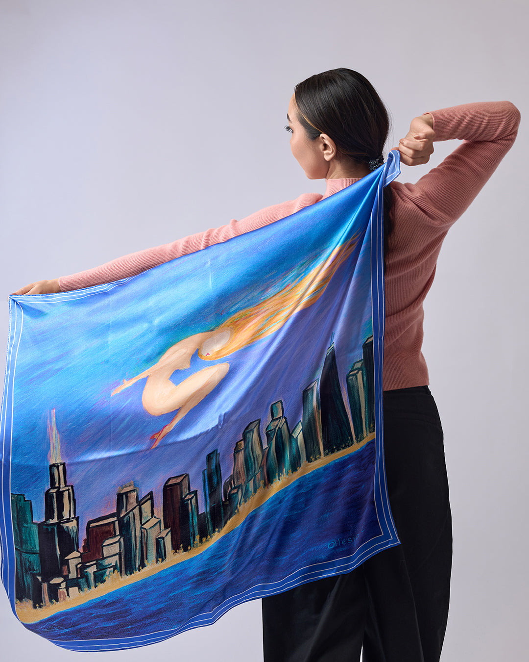 Midnight Muse pure silk scarf by Alesia Chaika, featuring a hand-painted golden muse flying over the Chicago skyline and Lake Michigan in deep blue tones. AlesiaC.com