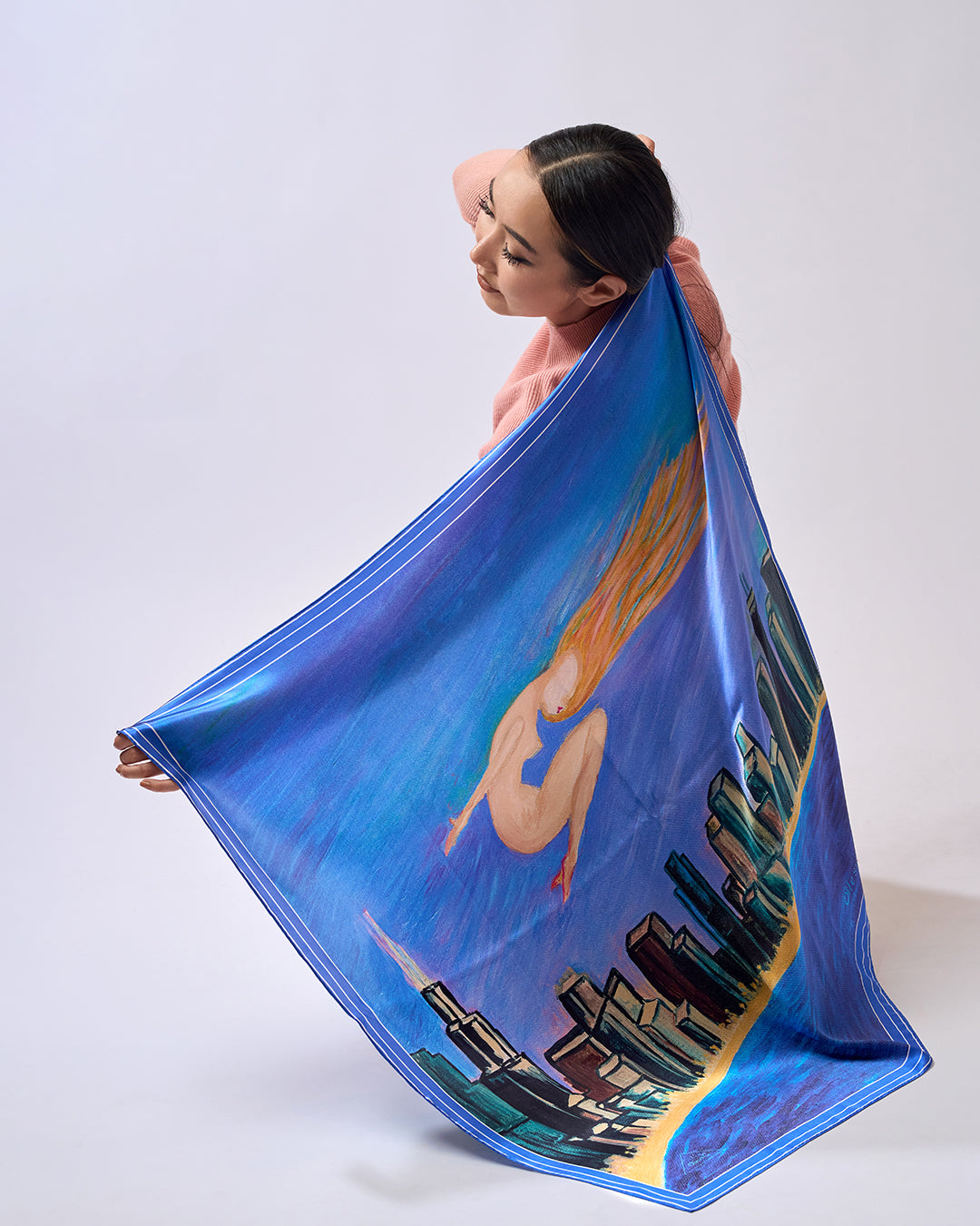 Midnight Muse pure silk scarf by Alesia Chaika, featuring a hand-painted golden muse flying over the Chicago skyline and Lake Michigan in deep blue tones. AlesiaC.com