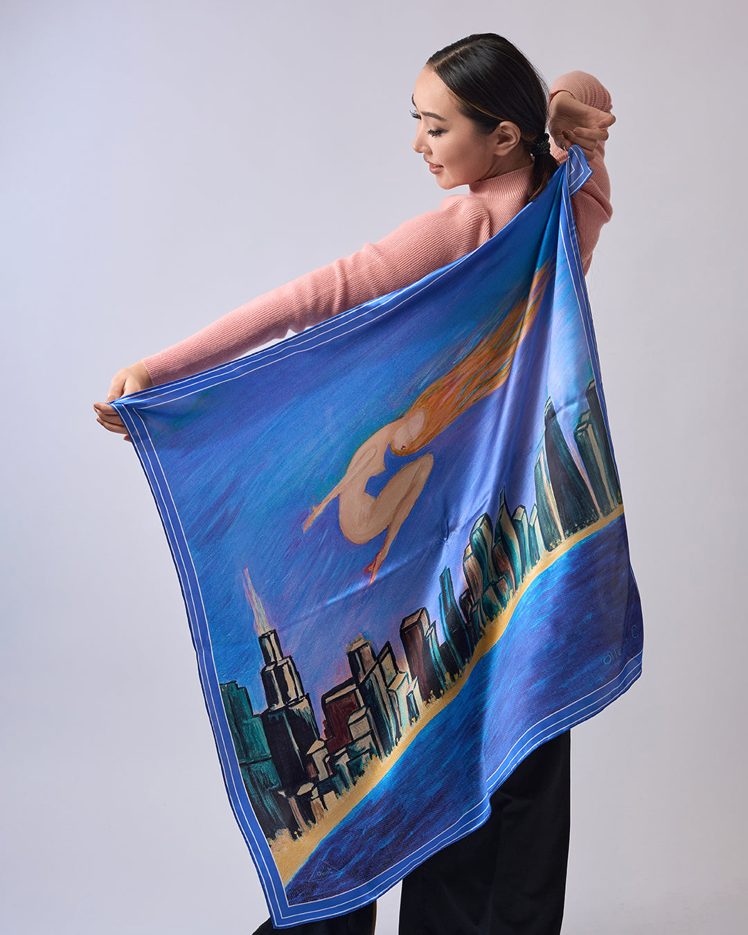Midnight Muse pure silk scarf by Alesia Chaika, featuring a hand-painted golden muse flying over the Chicago skyline and Lake Michigan in deep blue tones. AlesiaC.com