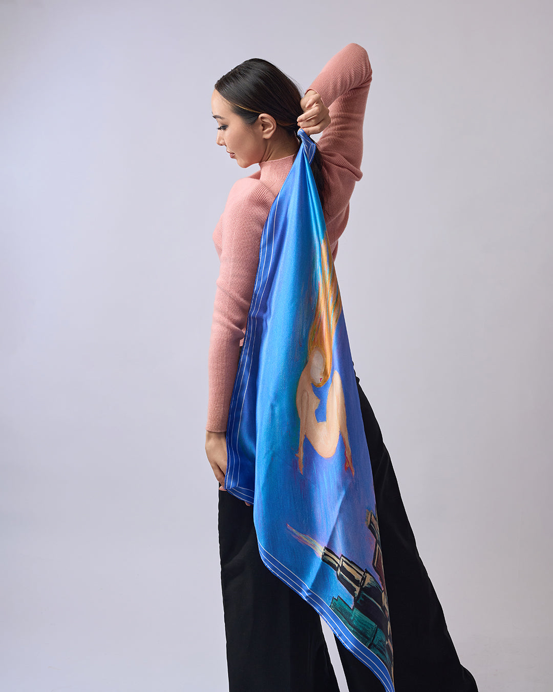 Midnight Muse pure silk scarf by Alesia Chaika, featuring a hand-painted golden muse flying over the Chicago skyline and Lake Michigan in deep blue tones. AlesiaC.com