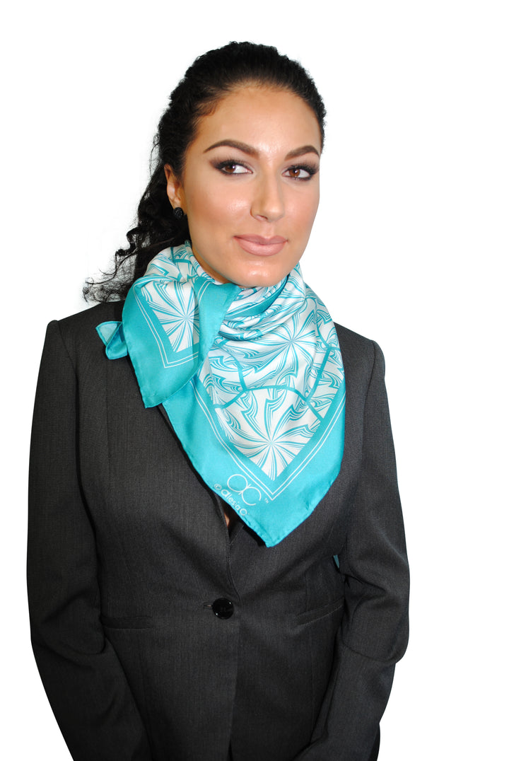 Turquoise Green White DANDELION SNOW Snowflakes Designer Pure Silk Scarf Styled Over Neck and Shoulders With HighLand Scarf Ring in White Gold and Black Strapless Dress AlesiaC.com