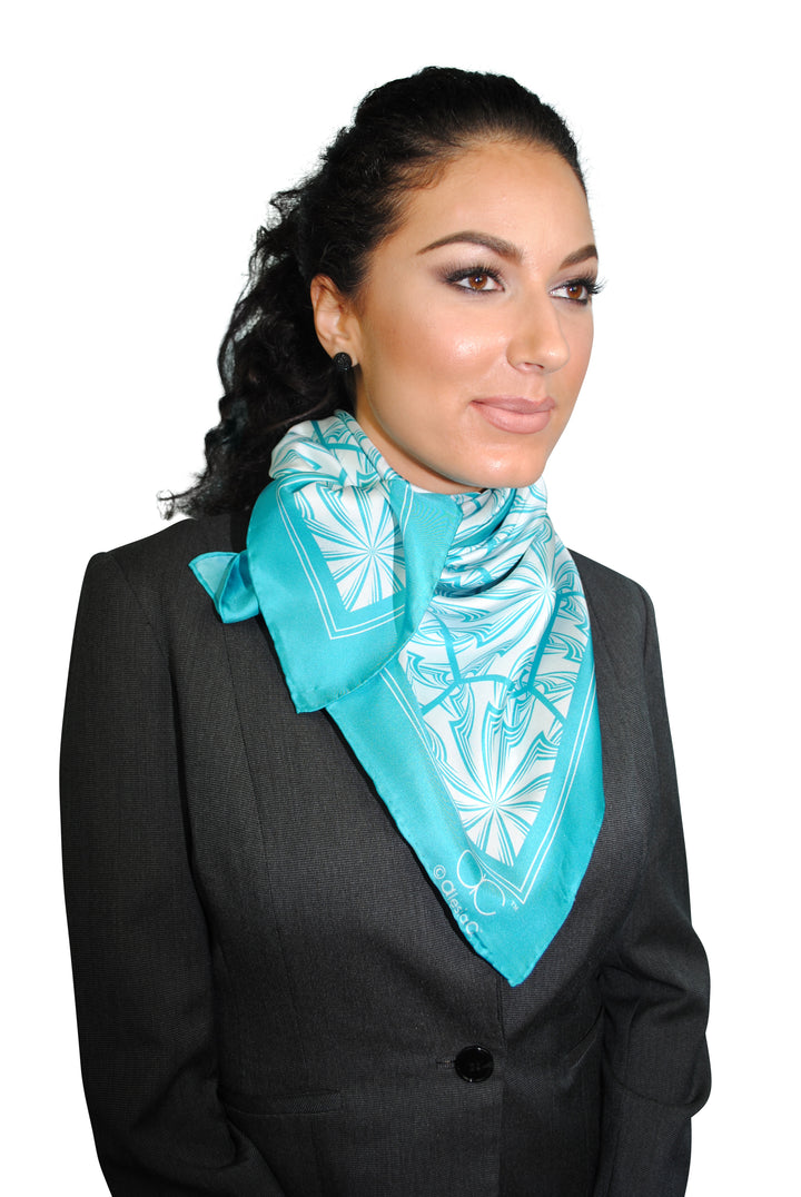 Turquoise Green White DANDELION SNOW Snowflakes Designer Pure Silk Scarf Styled Over Neck and Shoulders With HighLand Scarf Ring in White Gold and Black Strapless Dress AlesiaC.com