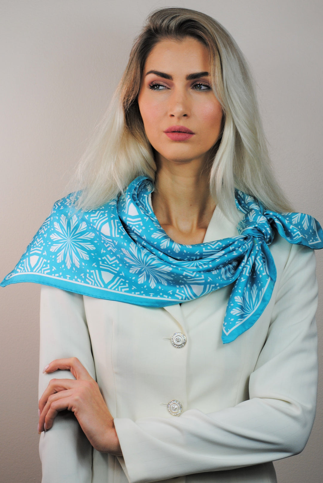 White Snowflakes on Turquoise Aster Mandala 100& Silk Charmeuse Scarf in Green and White Styled Over Shoulders Double Front Knot by Alesia Chaika Mandala Collection AlesiaC.com