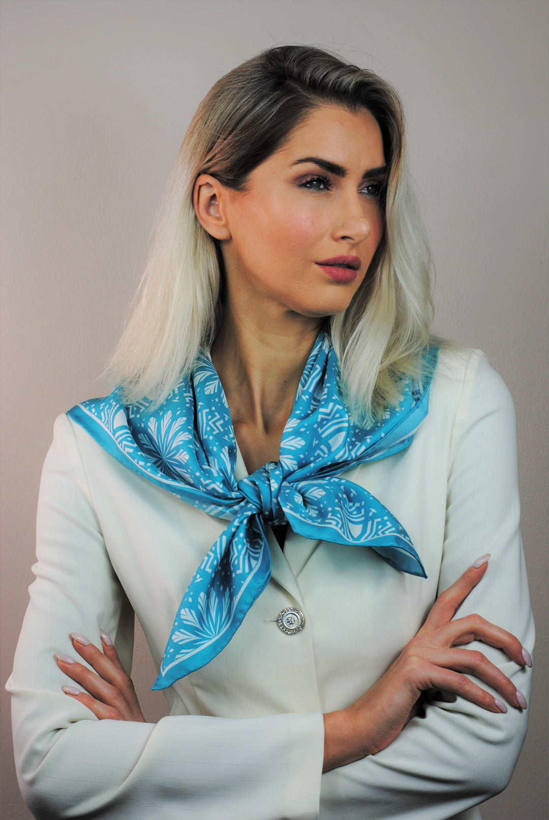 White Snowflakes on Turquoise Aster Mandala 100& Silk Charmeuse Scarf in Green and White Styled Over Shoulders Double Front Knot by Alesia Chaika Mandala Collection AlesiaC.com