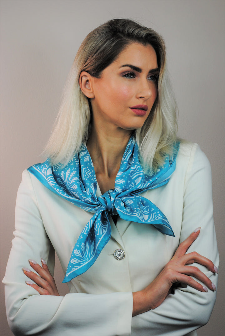 White Snowflakes on Turquoise Aster Mandala 100& Silk Charmeuse Scarf in Green and White Styled Over Shoulders Double Front Knot by Alesia Chaika Mandala Collection AlesiaC.com