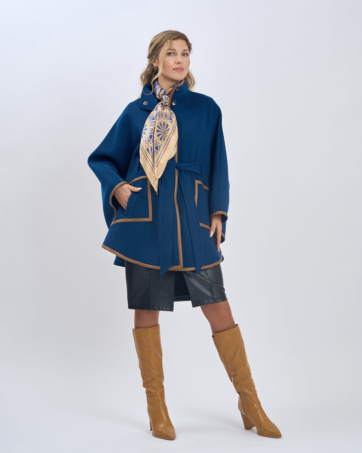 Gold Navy Blue Silk Scarf Styled With Infinity8 Scarf Ring and Paired With Navy Blue Short SWAN Cape-Coat With Brown Leather Trim, Black Felted Wool Visor Beret, Black Leather Skirt and Beige High Boots by Alesia Chaika AlesiaC.com 