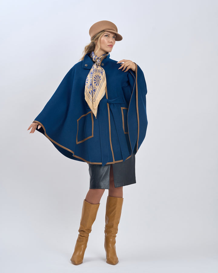 Gold Navy Blue Silk Scarf Styled With Infinity8 Scarf Ring and Paired With Navy Blue Short SWAN Cape-Coat With Brown Leather Trim, Black Felted Wool Visor Beret, Black Leather Skirt and Beige High Boots by Alesia Chaika AlesiaC.com 