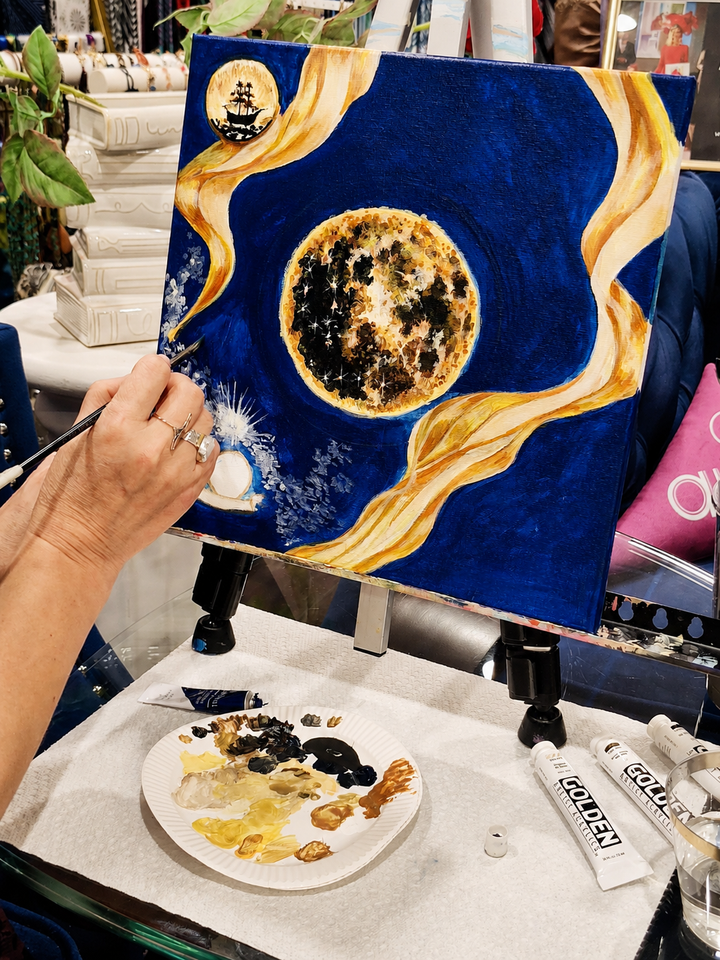 Alesia Chaika painting the original artwork for the TO NEW HEIGHTS™ America 250 silk scarf, celebrating the USA 250th anniversary 1776–2026 with a symbolic journey from ship to moon.