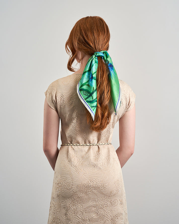 How To tie a silk scarf over your ponytail. Featuring the CORNFLOWERS DREAM Royal Blue and Green Wearable Art 100% Pure Silk Scarf by Alesia Chaika. Copy of an original signed fine artwork on canvas.
